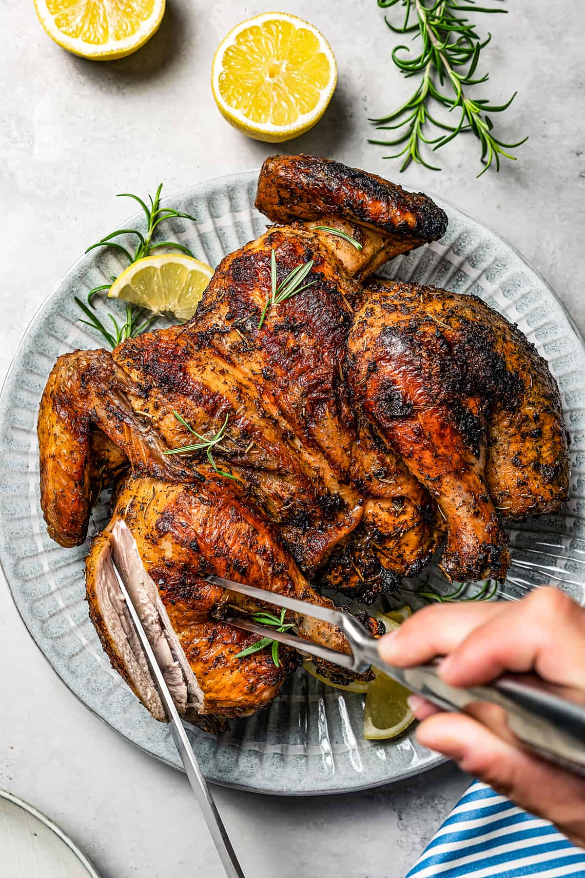 Whole butterflied chicken on the outlet grill