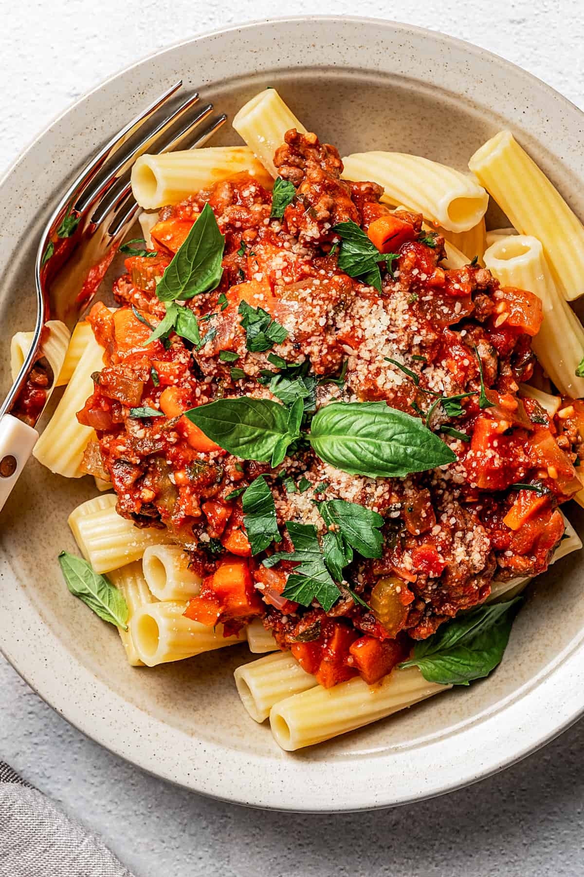 A bowl of pasta bolognese.