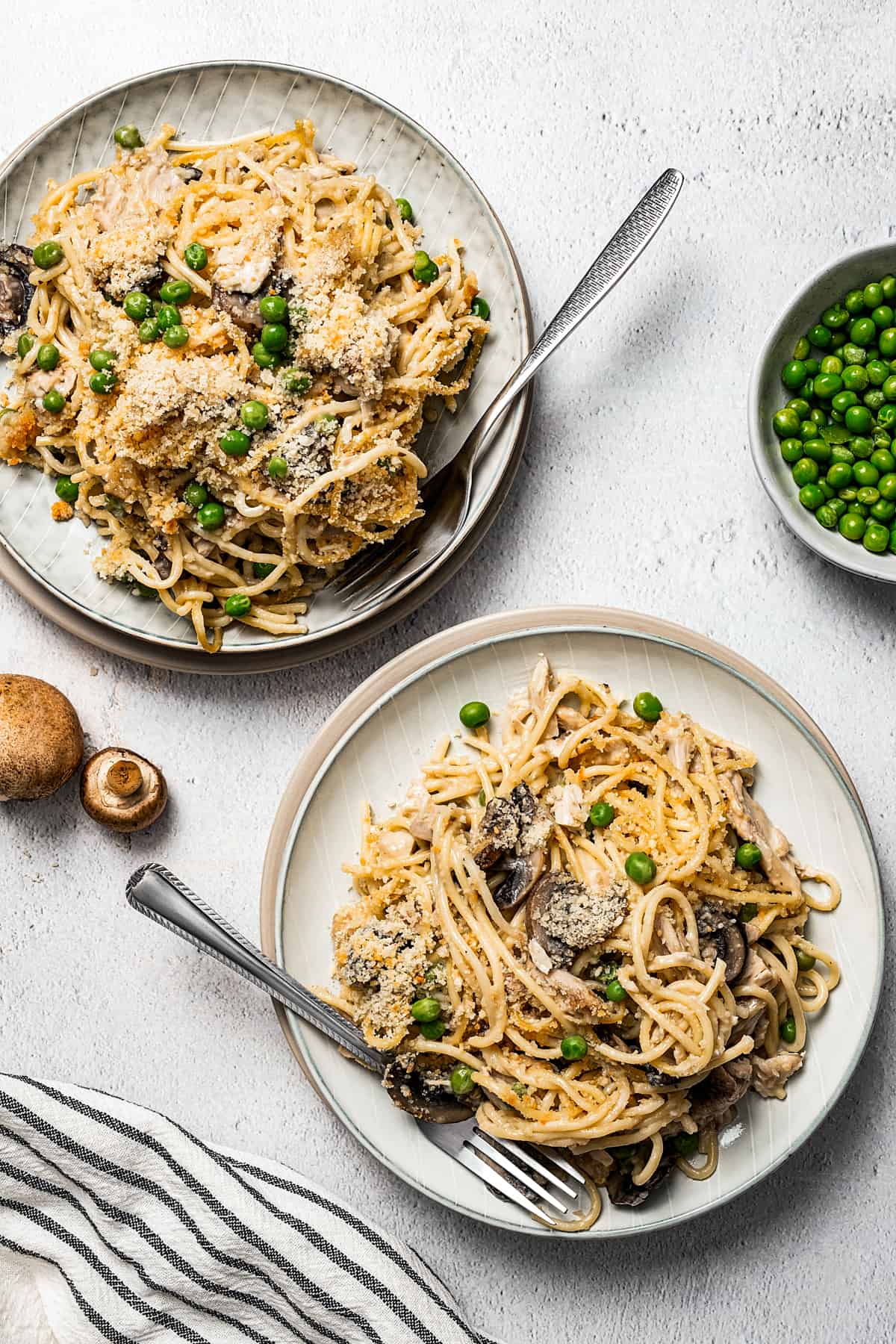 Two plates of creamy turkey pasta.