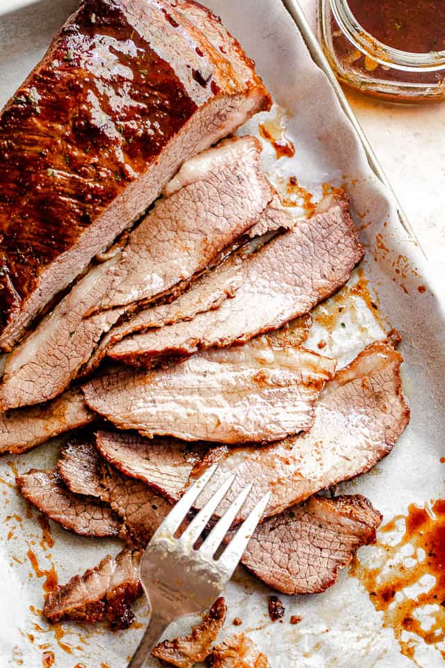Overhead photo of thinly sliced Slow Cooker Barbecue Beef Brisket 