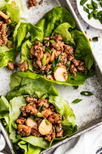 overhead shot of Asian lettuce wraps on a baking tray.