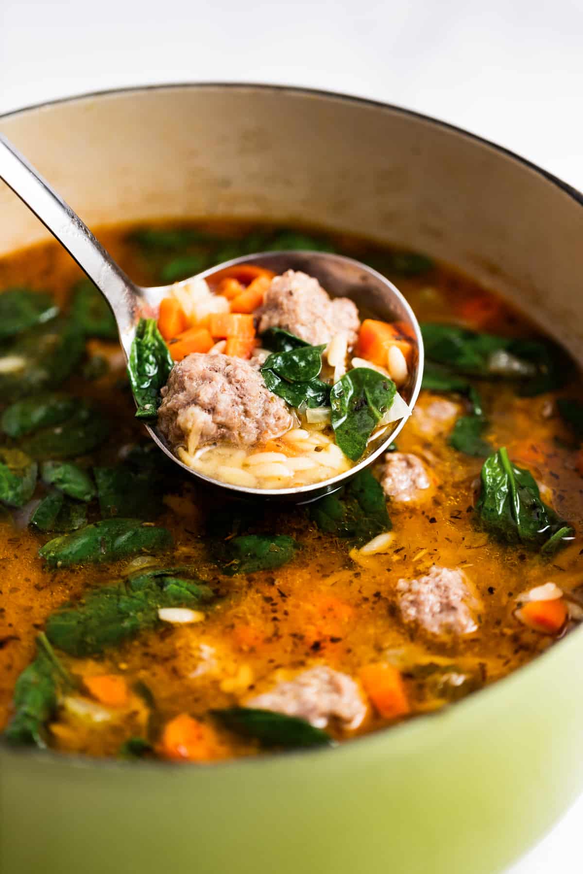Cooked Italian wedding soup in the pot.