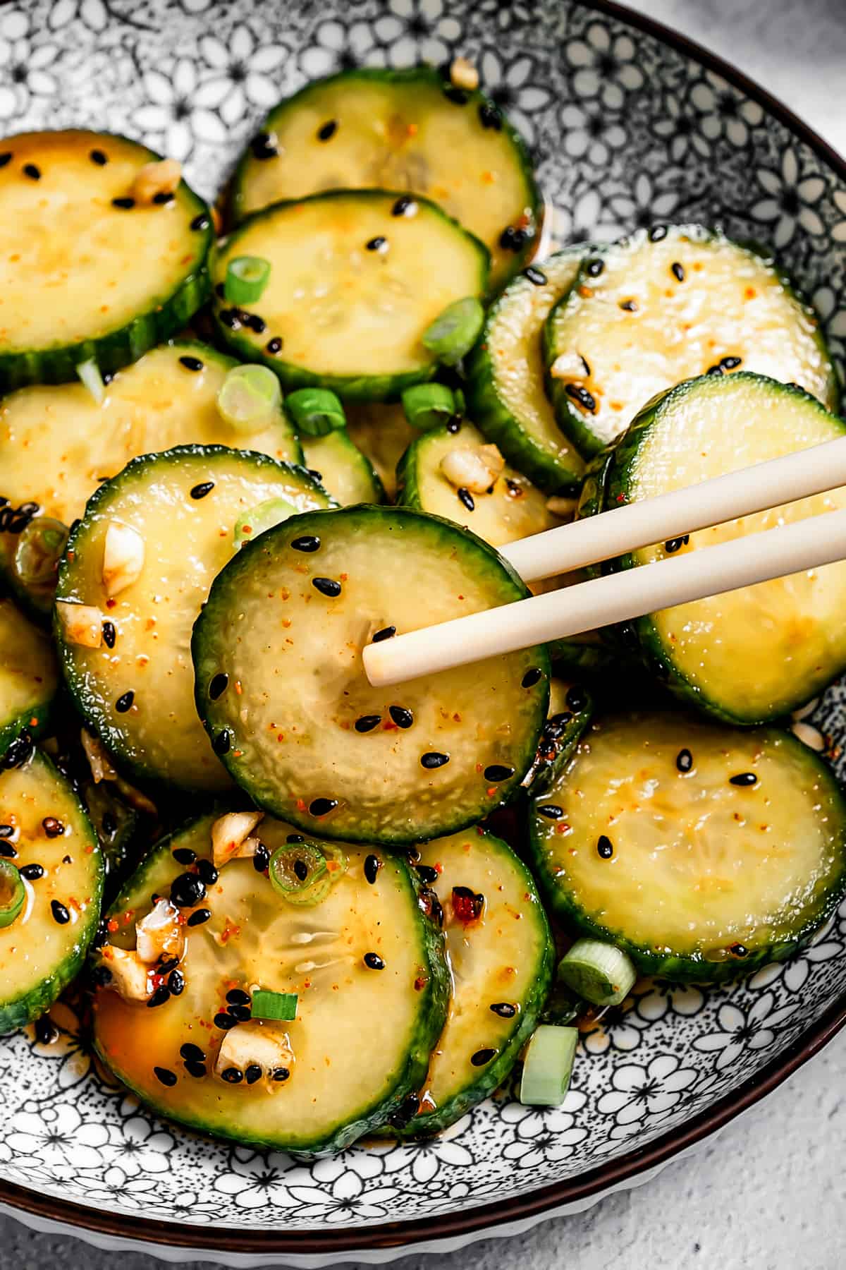Grabbing a cucumber from the Asian cucumber salad.