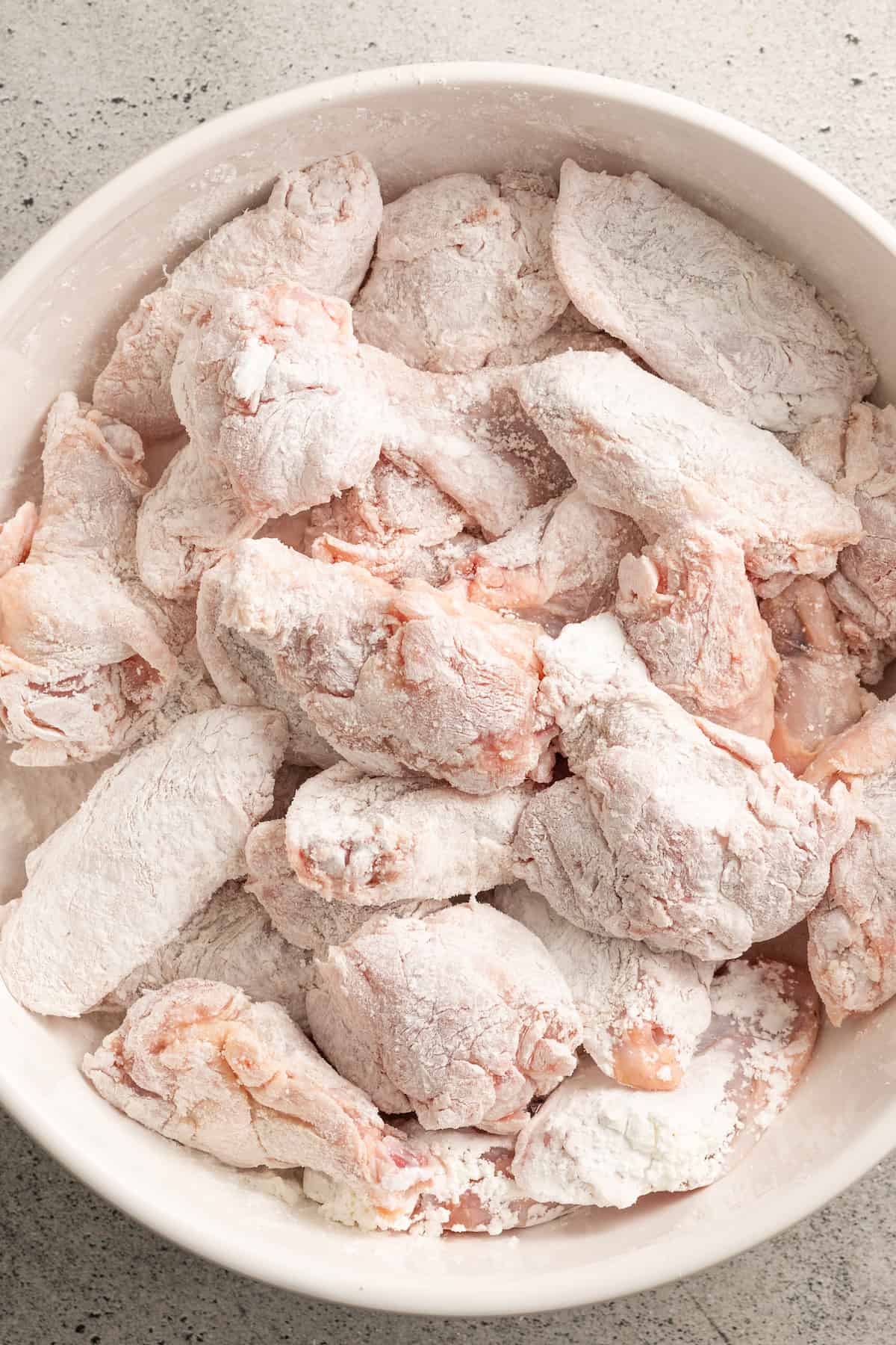 These garlic Parmesan chicken wings are crispy, juicy, and tossed in a buttery garlic Parmesan sauce. They’re easy to make right in the oven!