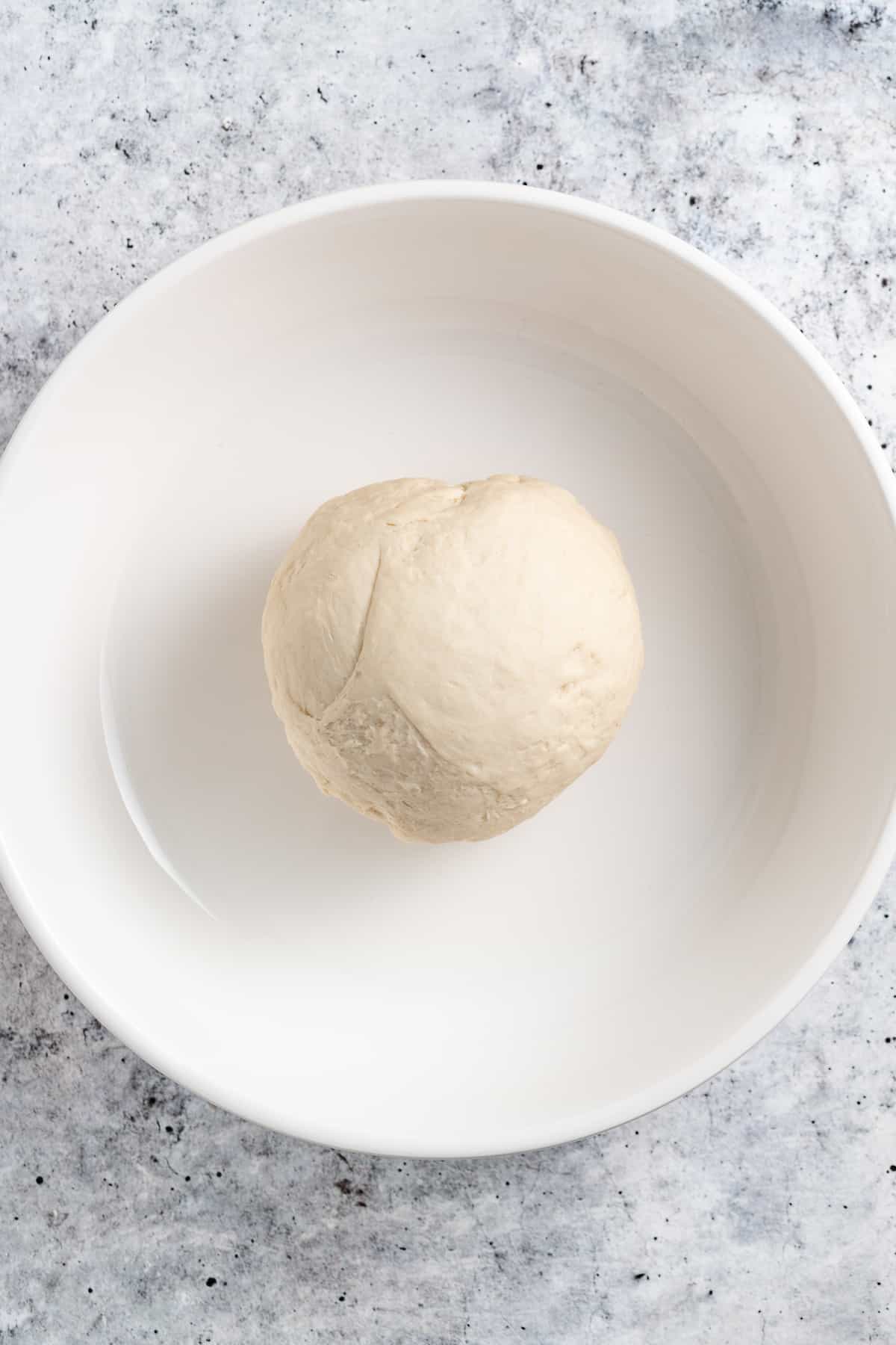 Rolling the dough into a ball.