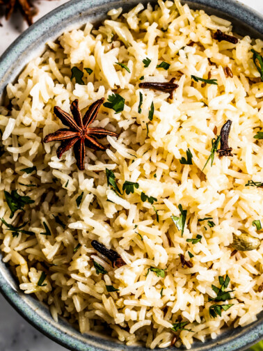 Cumin rice in a large bowl.