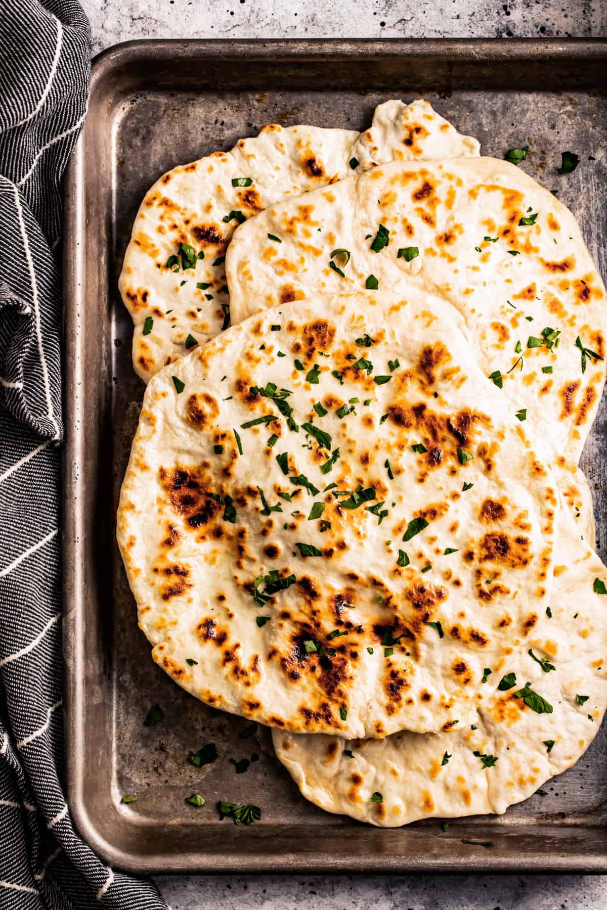 armenian flatbread, also known as lavash, placed on a baking sheet.