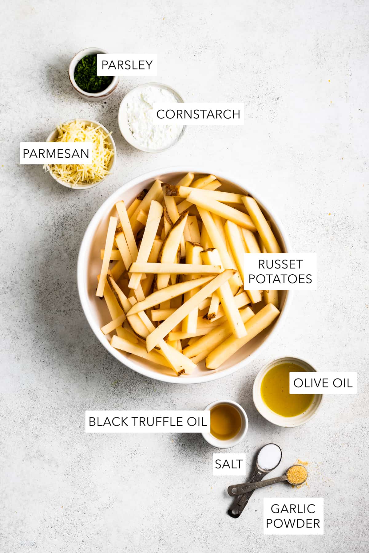 an overhead shot of the ingredients for parmesan truffle fries.