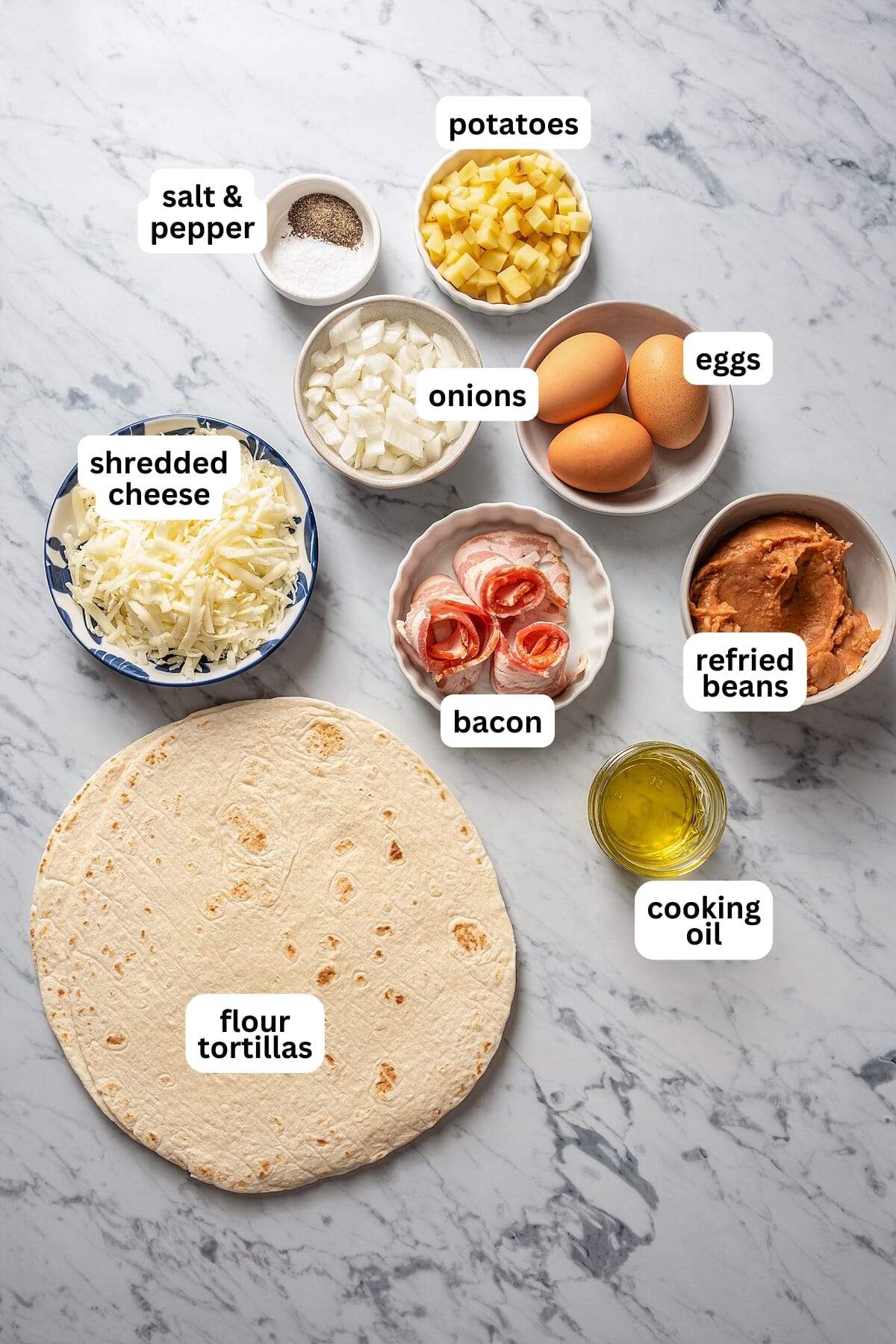 Image of all the ingredients needed to make breakfast quesadillas.
