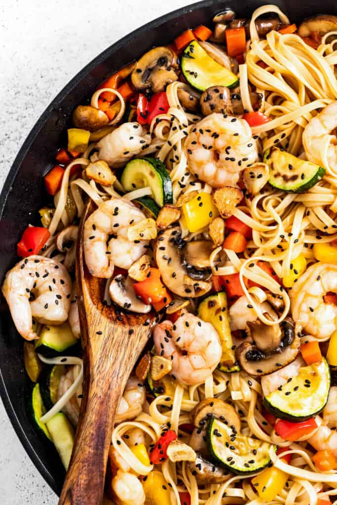 Shrimp lo mein in the pan.