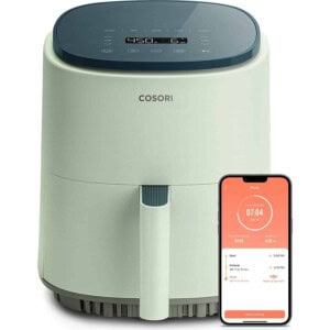 Green Cosori air fryer with an iphone