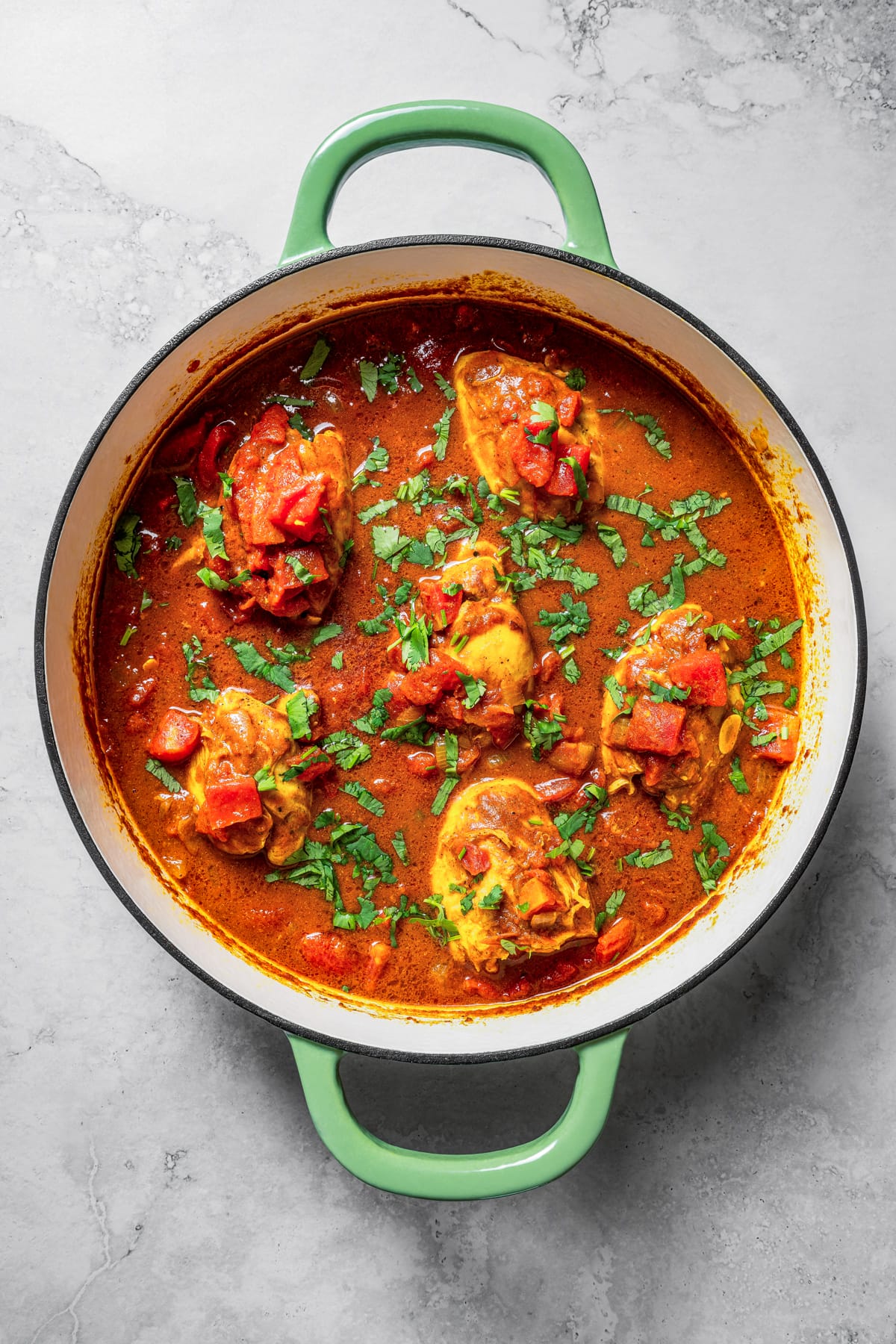 Rogan josh chicken in pan.