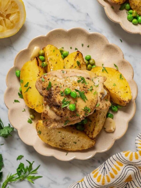 Chicken Vesuvio served on a plate.