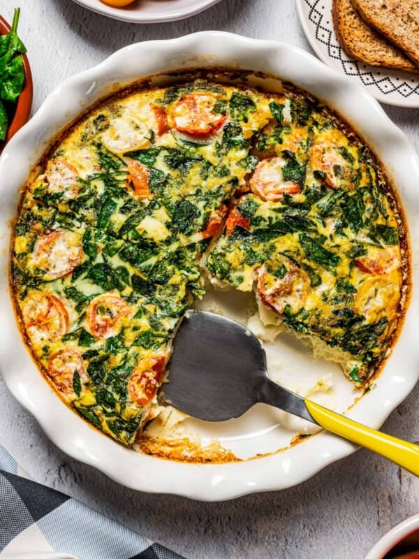 Serving egg white frittata with a spatula.