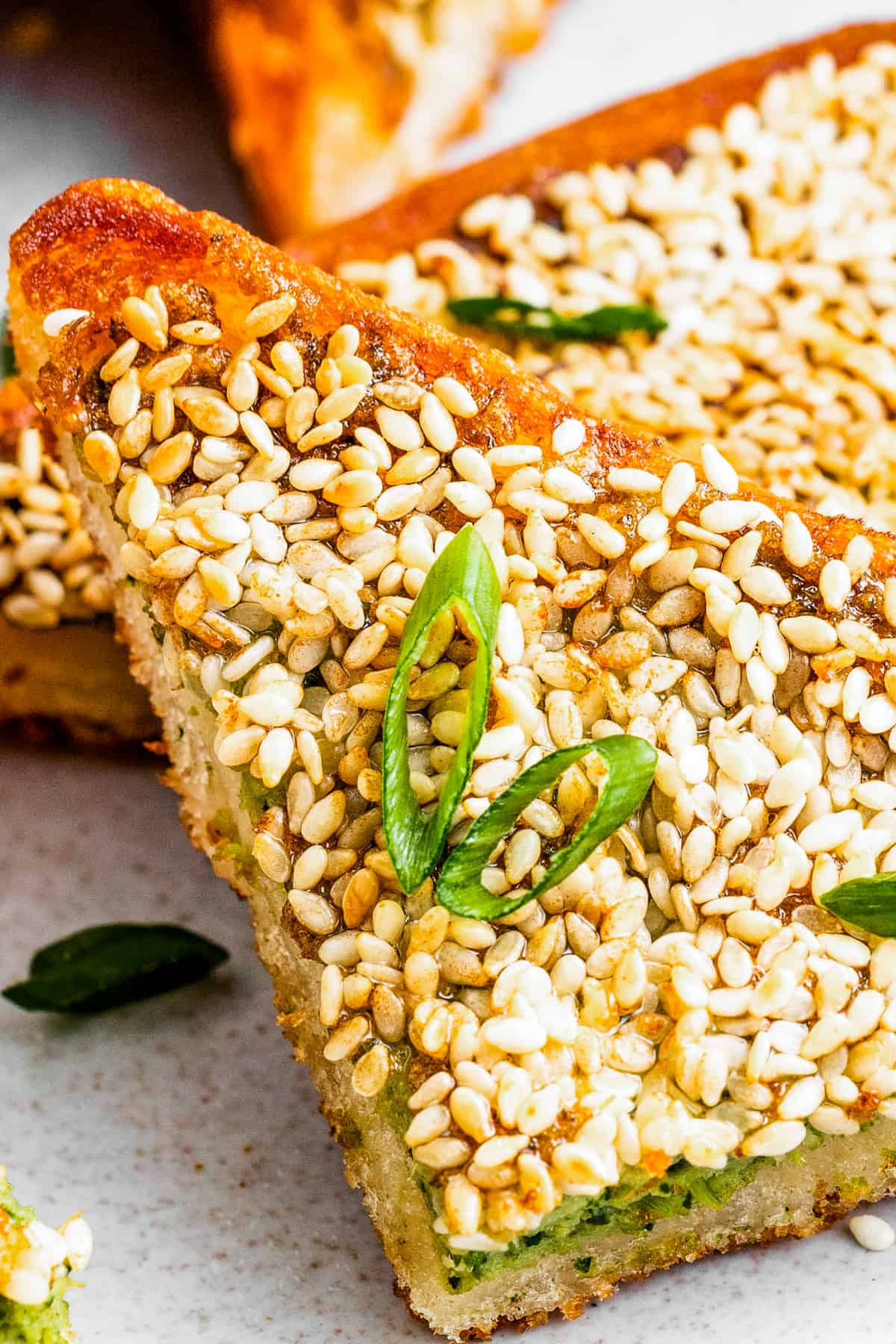 Close up shot of a toast topped with sesame seeds.