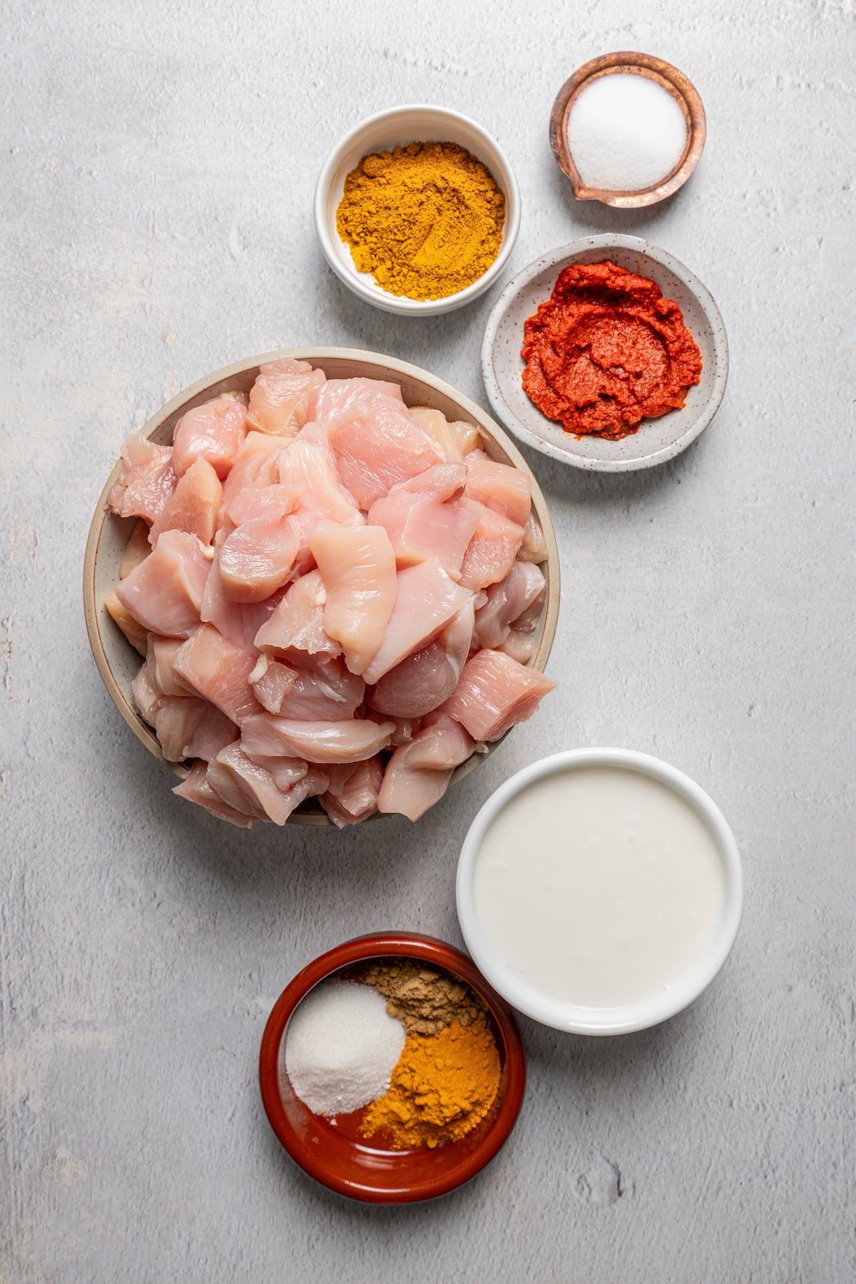 Ingredients for chicken satay skewers.