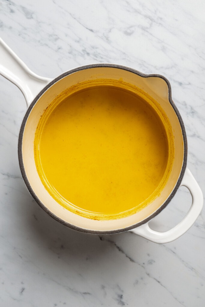 Golden latte in a pot.