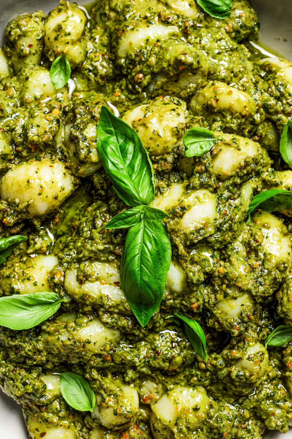 Closeup overhead of avocado pesto pasta.