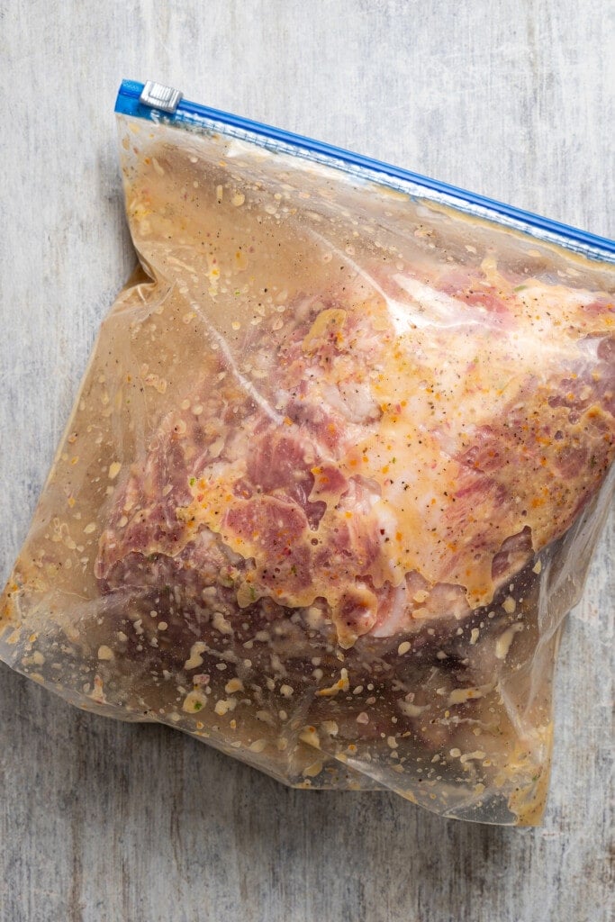 Pork butt in a Ziplock bag with marinade.