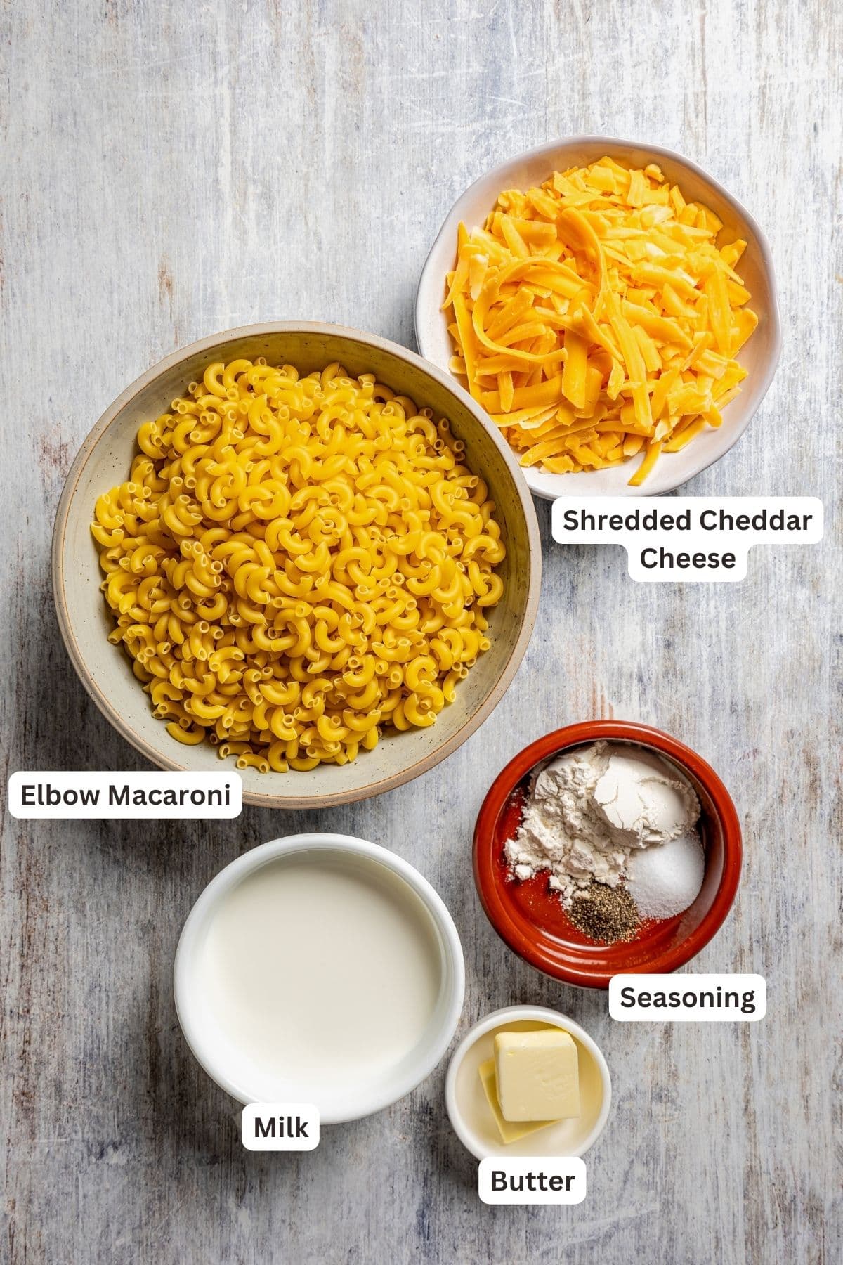 Labeled ingredients for pulled pork mac and cheese.