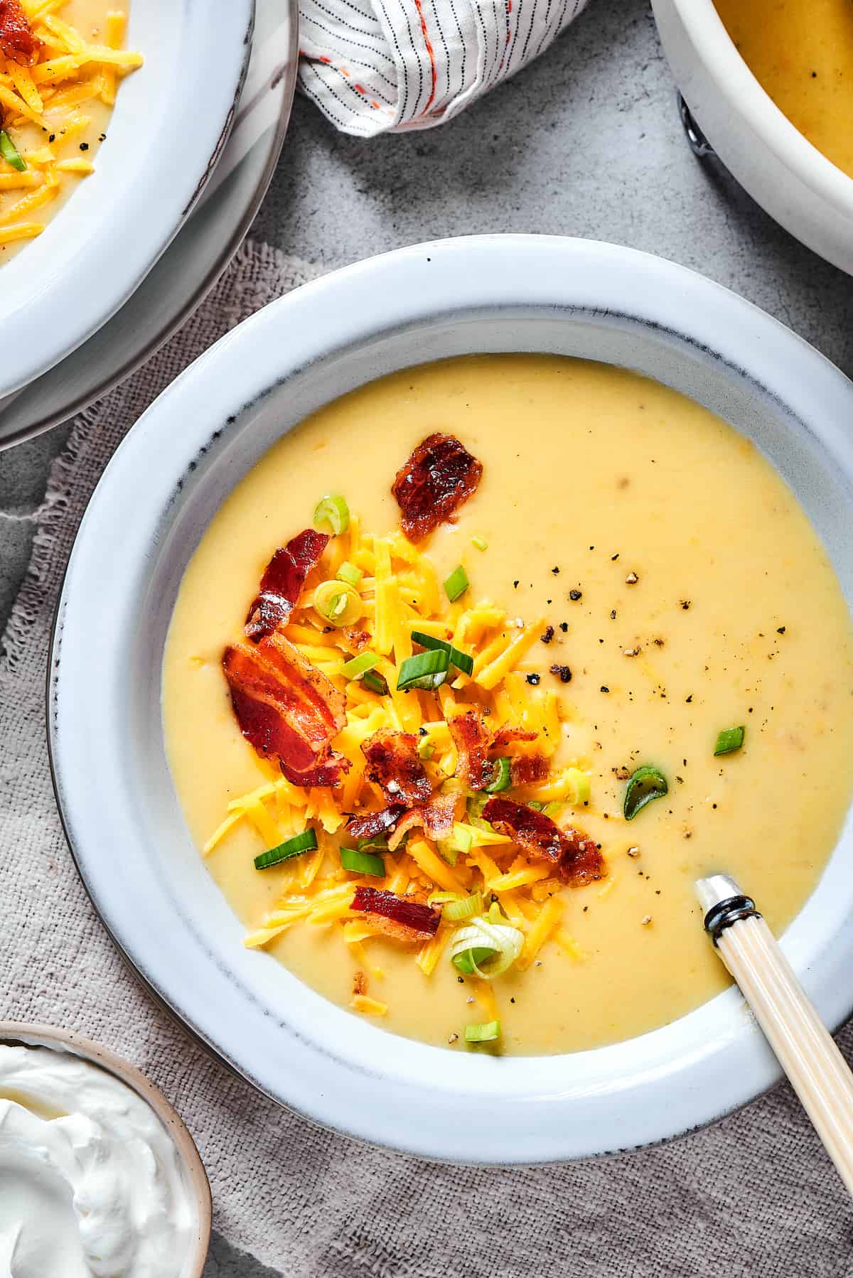 Baked potato soup served in a bowl.