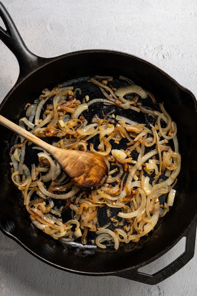 Caramelizing onions in a skillet.
