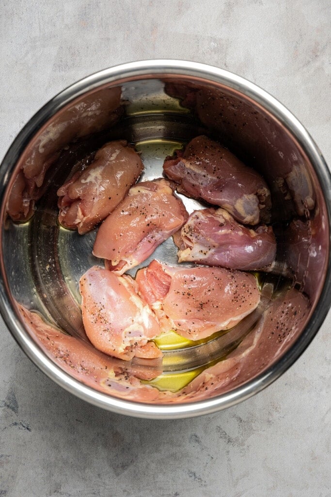 Searing chicken thighs in an Instant Pot.