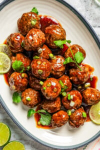 Overhead image of teriyaki meatballs arranged on a serving platter.