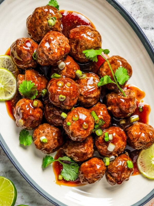 Overhead image of teriyaki meatballs arranged on a serving platter.