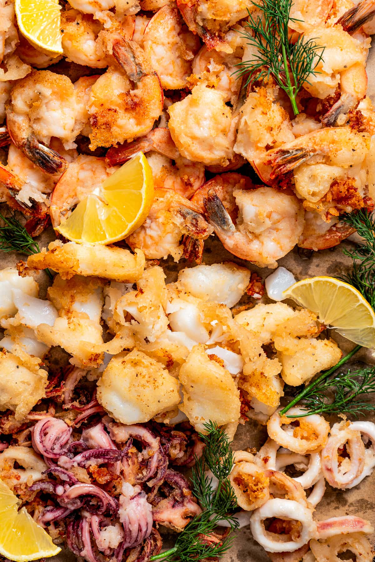 Up close image of fritto misto. A fried mix of seafood.