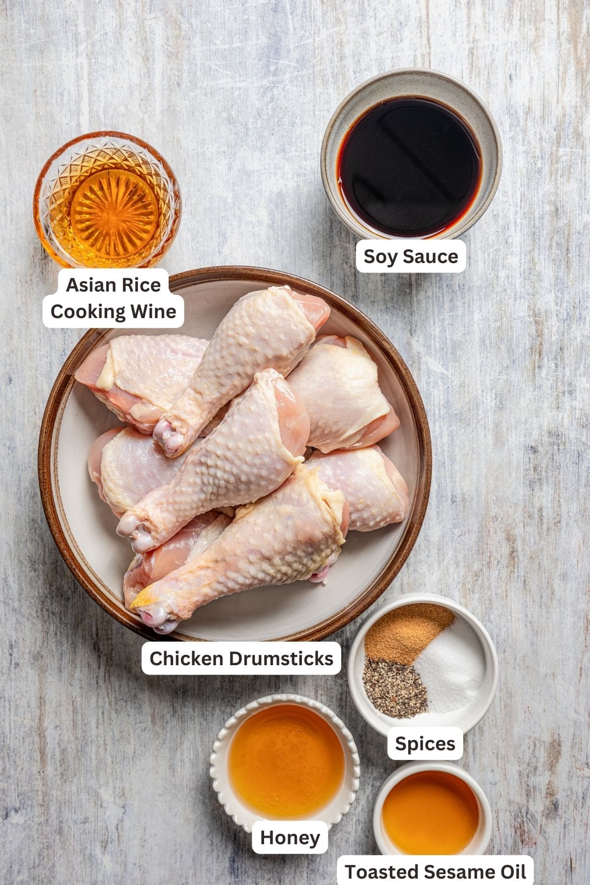 Ingredients for honey soy chicken with text labels overlaying each ingredient.