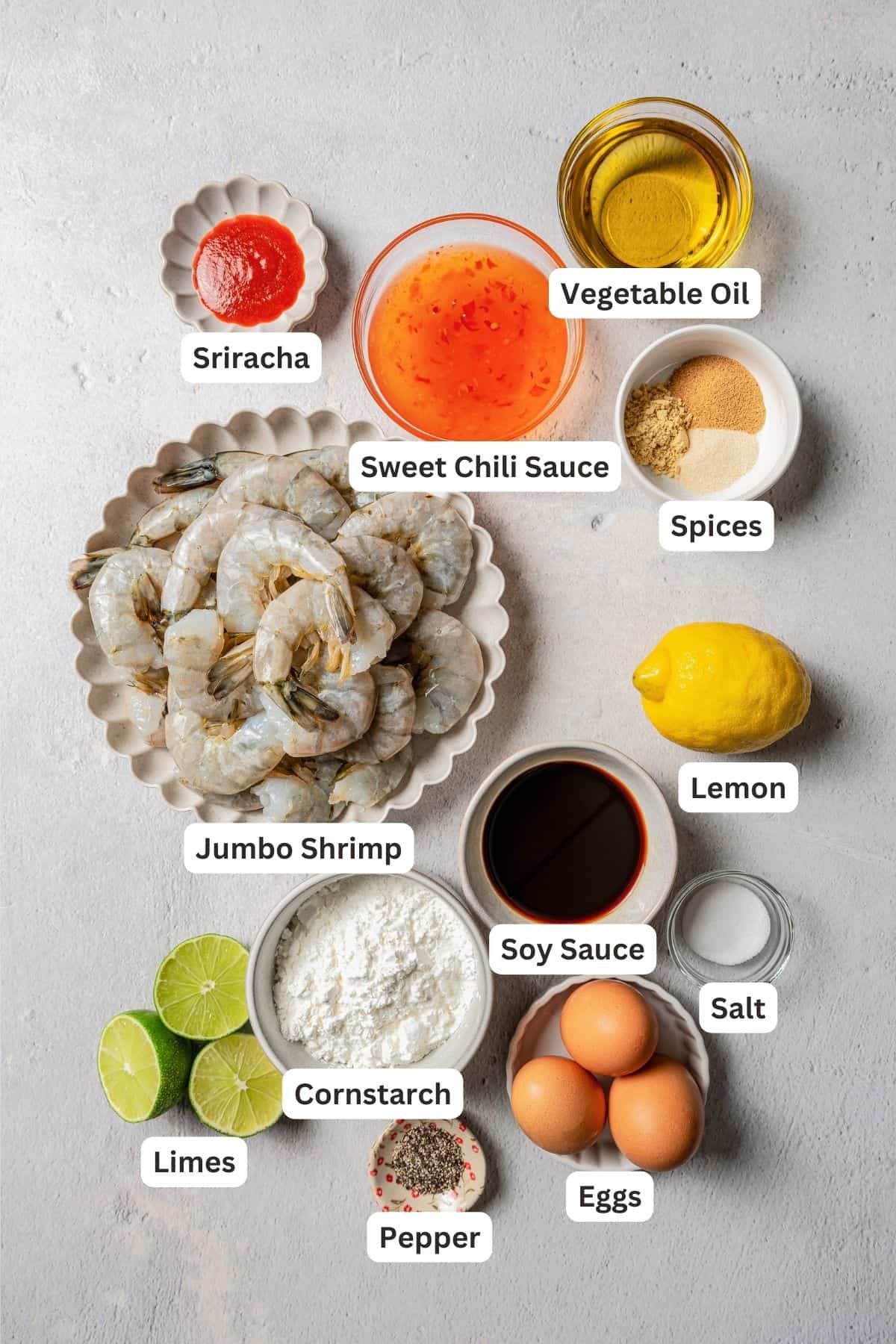 Ingredients for firecracker shrimp with text labels overlaying each ingredient.