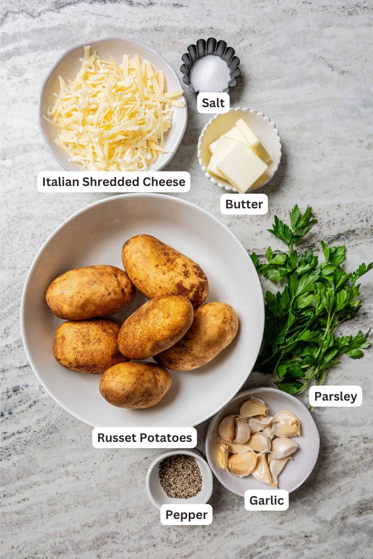 Ingredients for hasselback potatoes with text labels overlaying each ingredient.