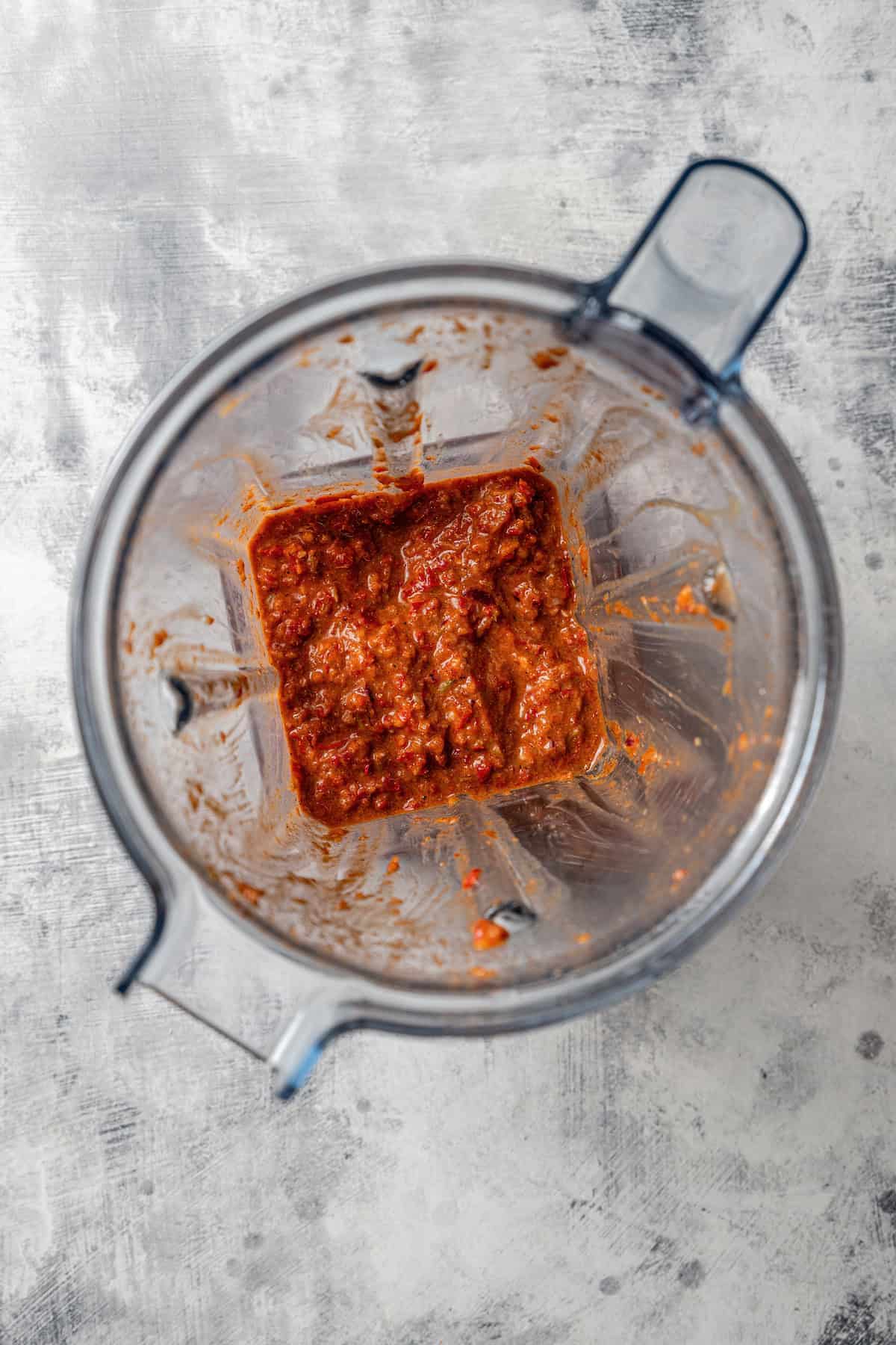 Overhead view of Massaman curry paste inside a blender.