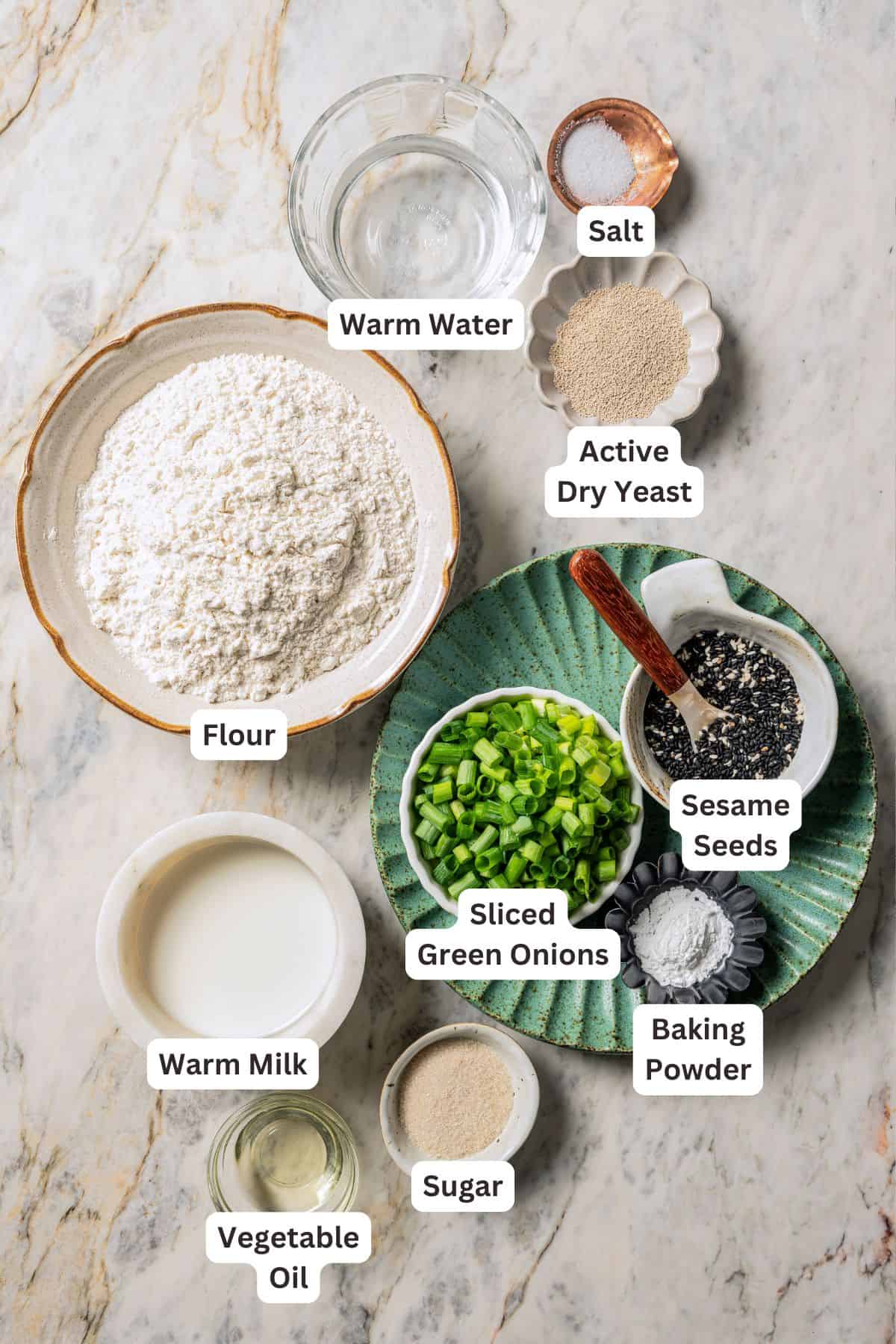 Bao buns ingredients with text labels overlaying each ingredient.