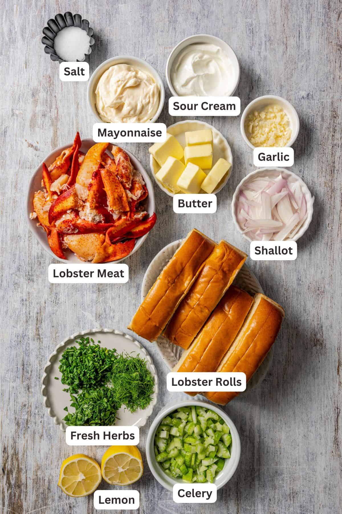 Lobster roll ingredients with text labels overlaying each ingredient.