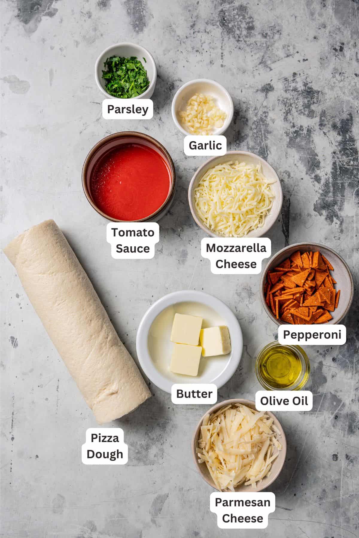 Pizza roll ingredients with text labels overlaying each ingredient.