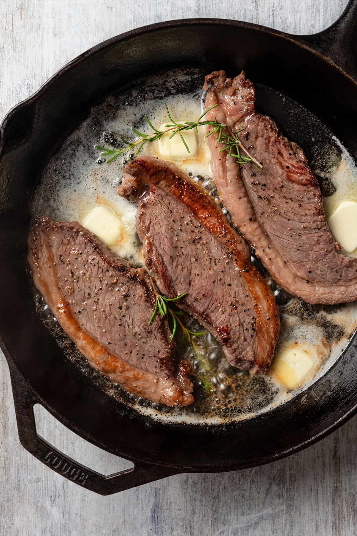 Seared coulotte steaks.