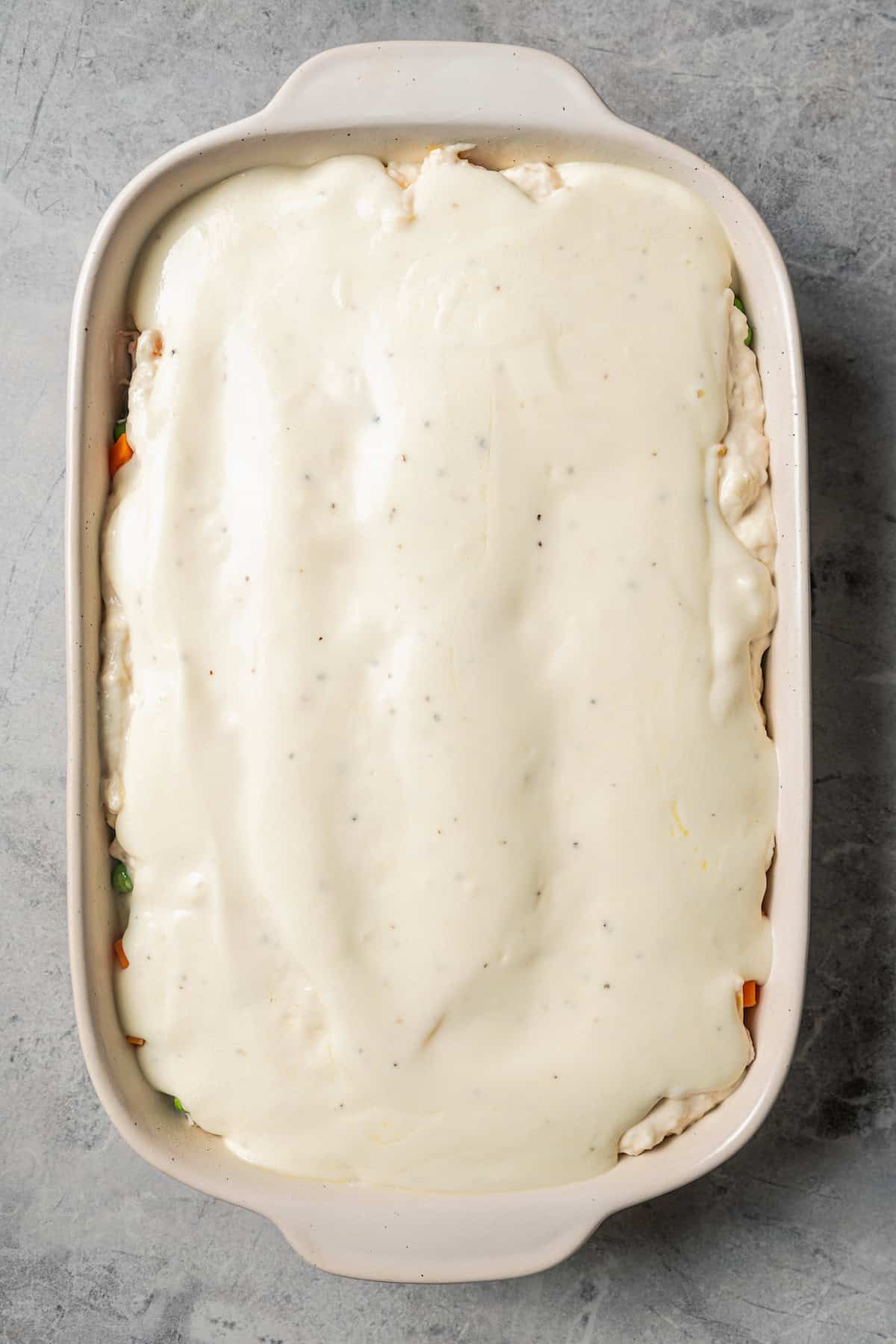 Topping layer adding to the baking dish.