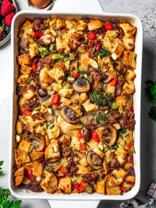 Baked breakfast casserole with sausage in a baking dish.