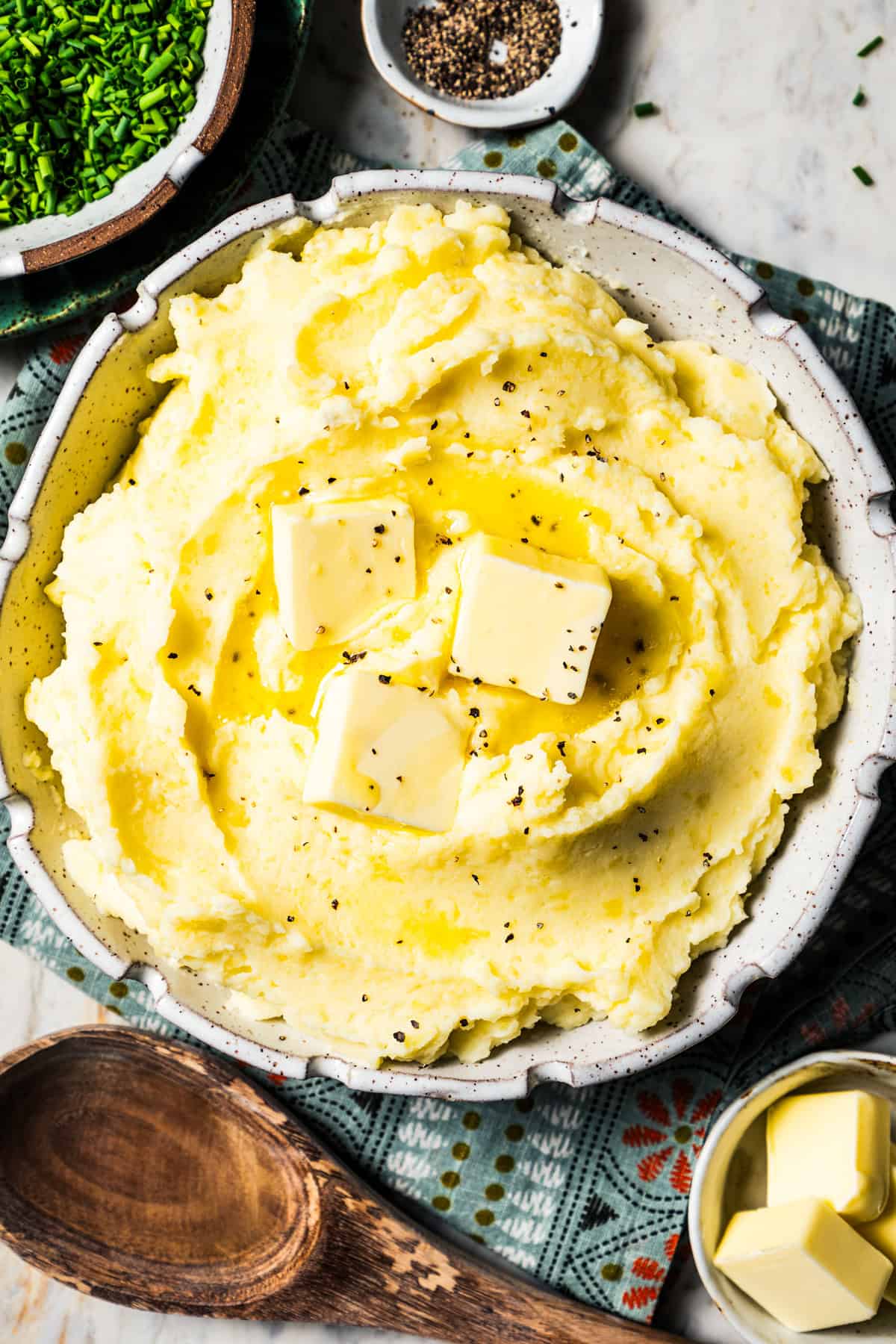 Weekly Meal Plan Buttermilk mashed potatoes in a bowl with butter.