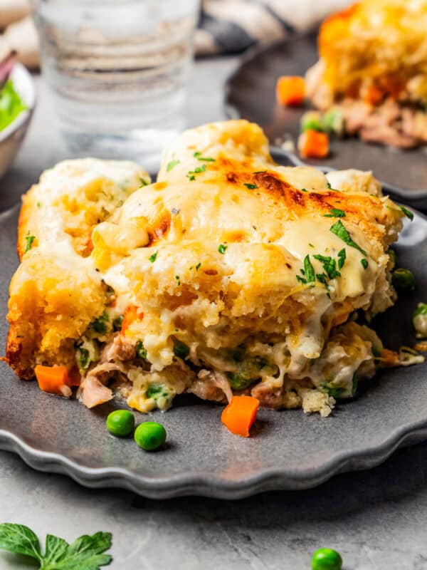 Scoop of chicken cobbler on a plate.