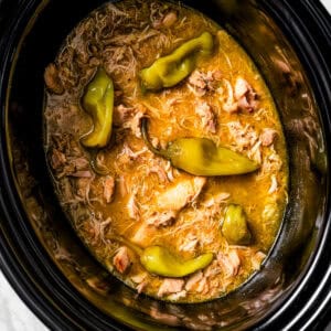 Overhead view of Mississippi chicken inside the slow cooker.