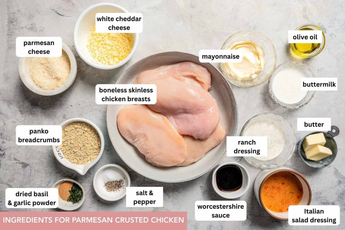This easy Parmesan crusted chicken recipe features marinated chicken breasts topped with a creamy, cheesy Parmesan sauce and crispy breadcrumbs. Parmesan crusted chicken ingredients with text labels overlaying each ingredient.