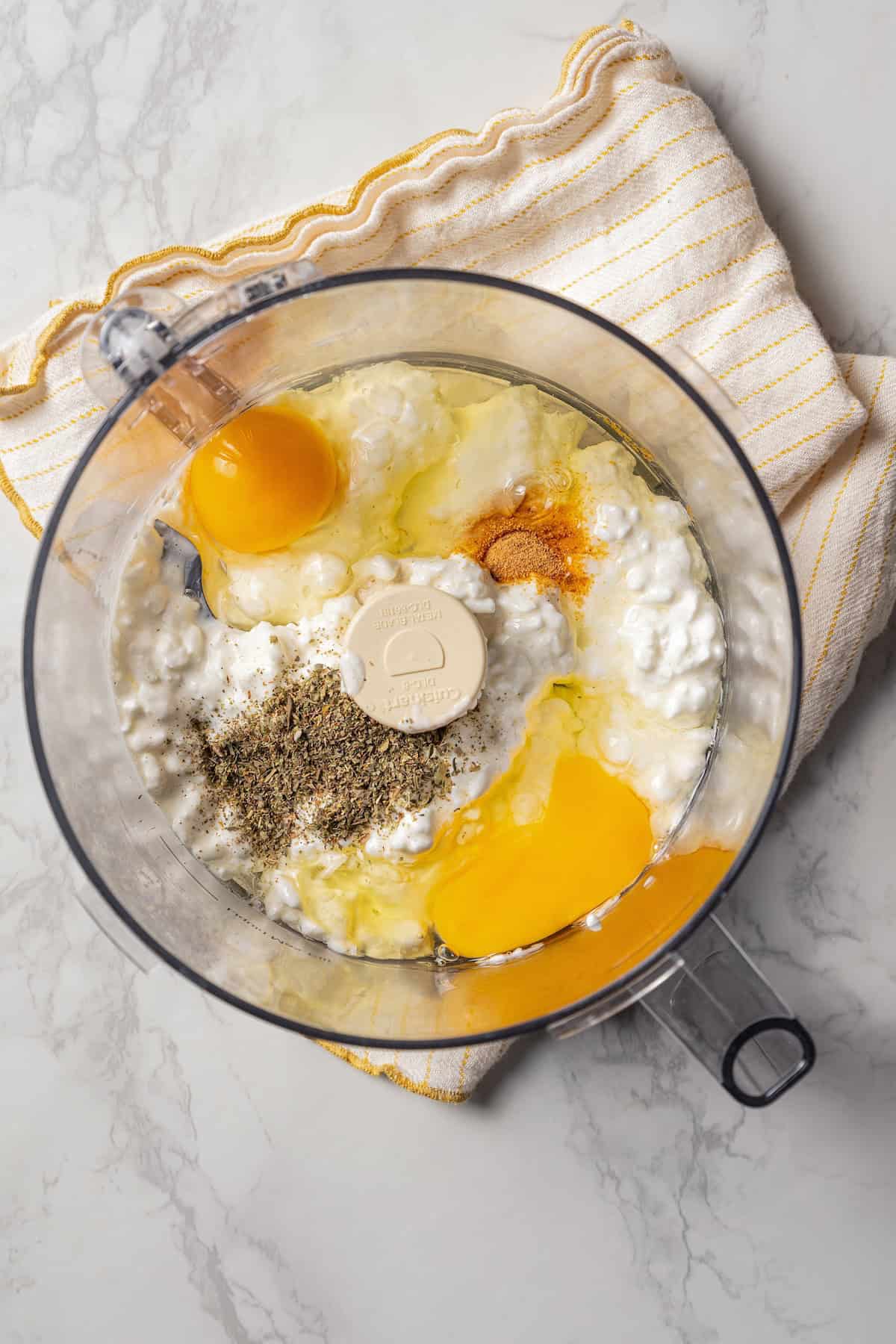 Cottage cheese flatbread ingredients combined in a food processor.