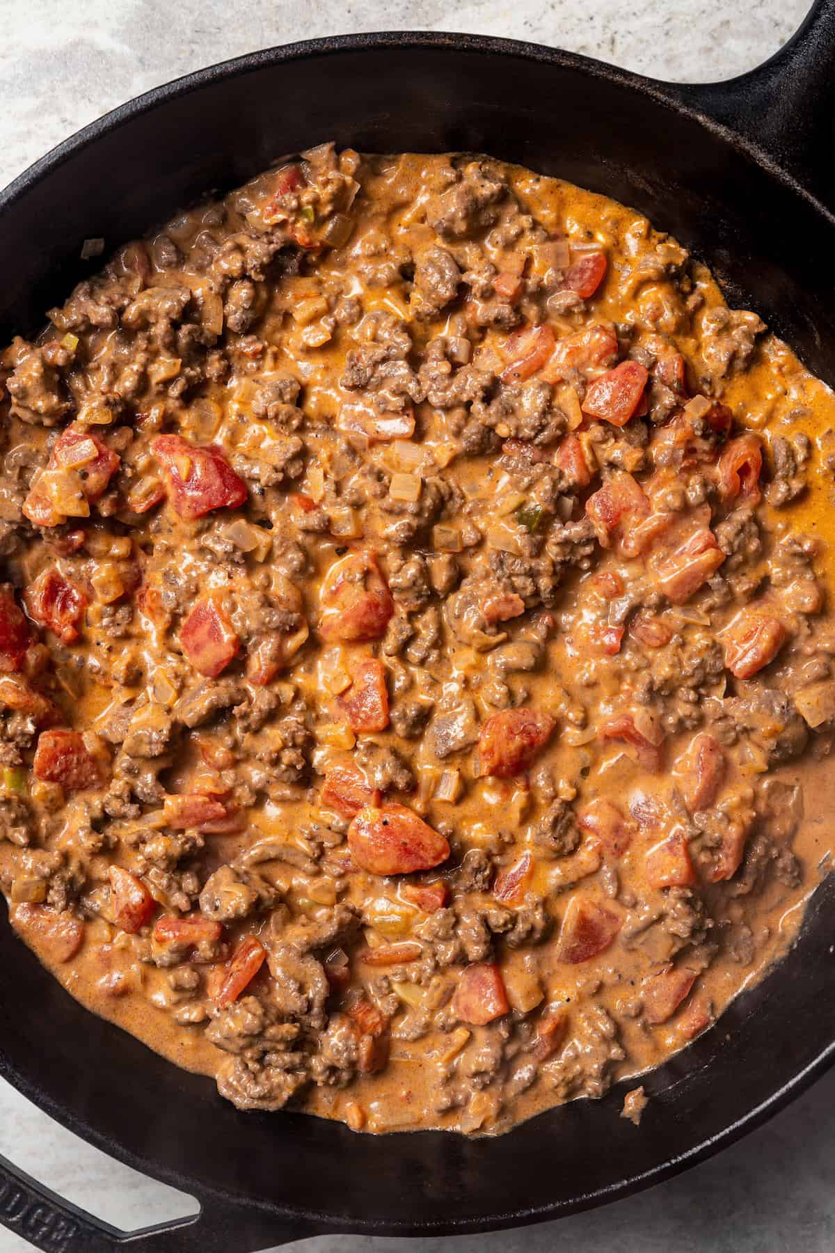 Taco casserole filling in a skillet.