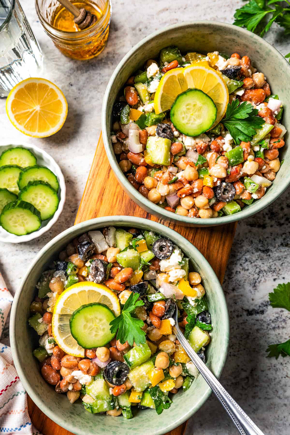 Dense bean salad served in two individual bowls.