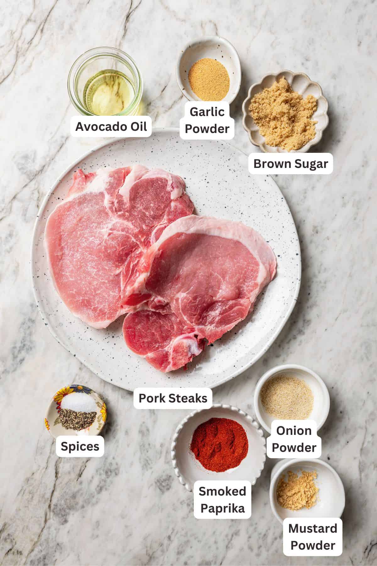 Pork steak ingredients with text labels overlaying each ingredient.