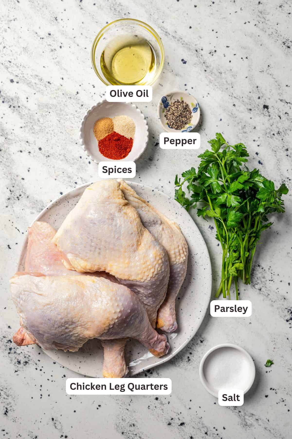 Chicken leg quarters seasonings and ingredients with text labels overlaying each ingredient.