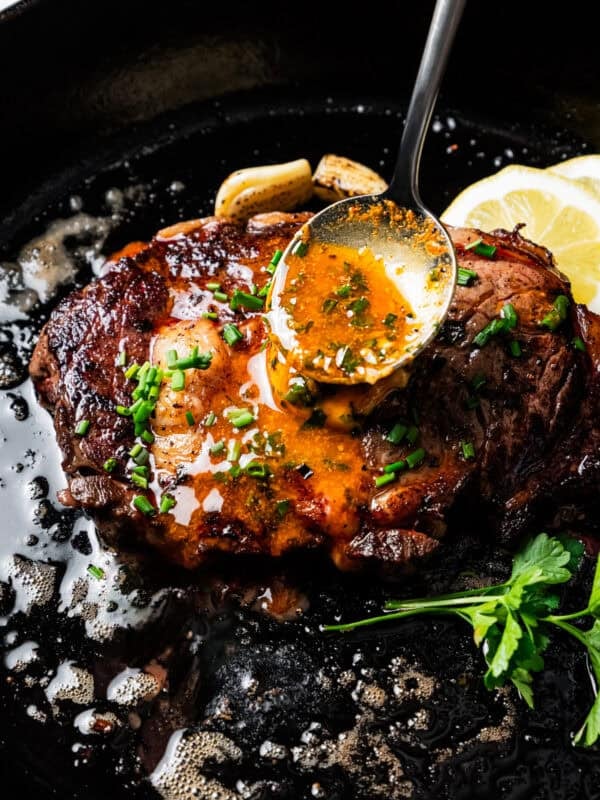 Basting a steak with cowboy butter.
